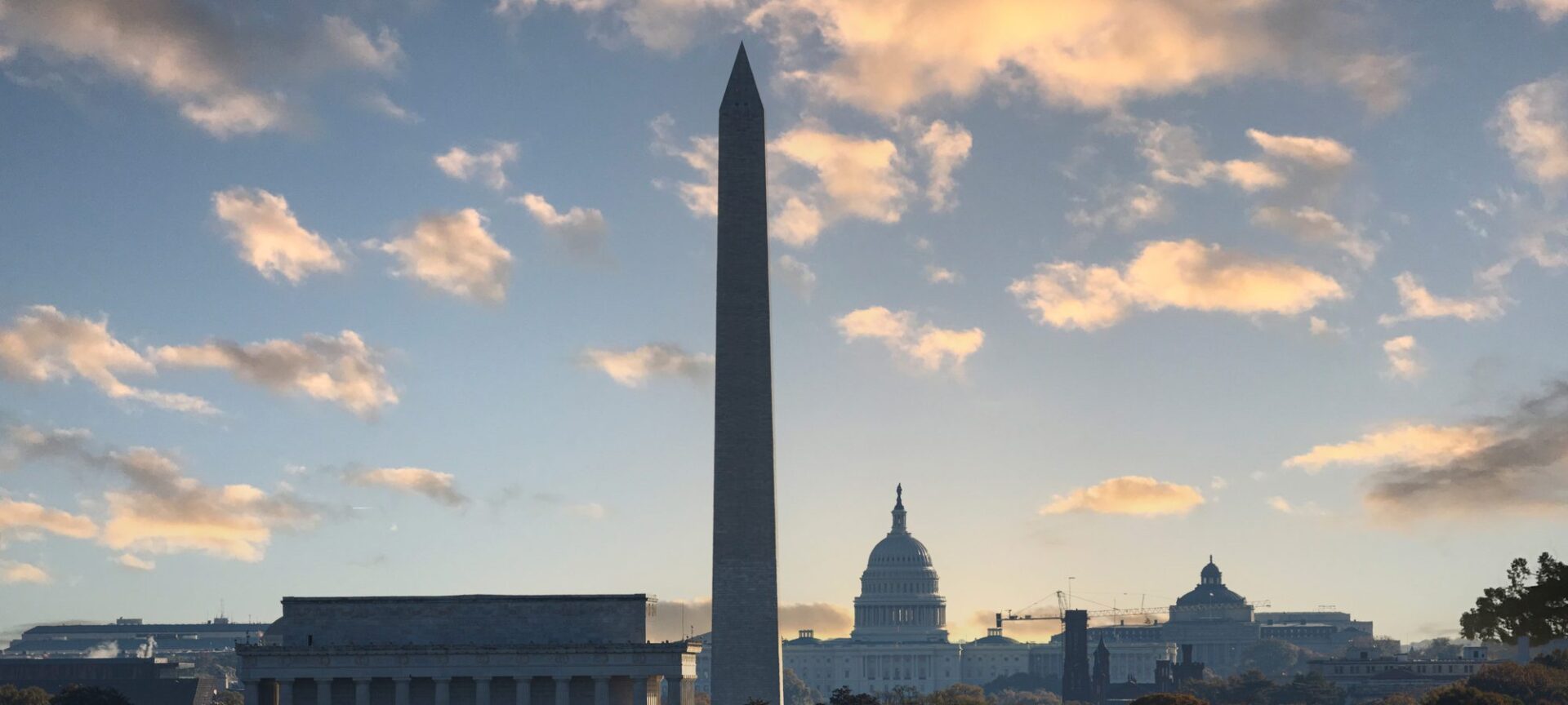 The Washington Monument, US Capitol and Lincoln Memorial at sunrise in Washington, DC